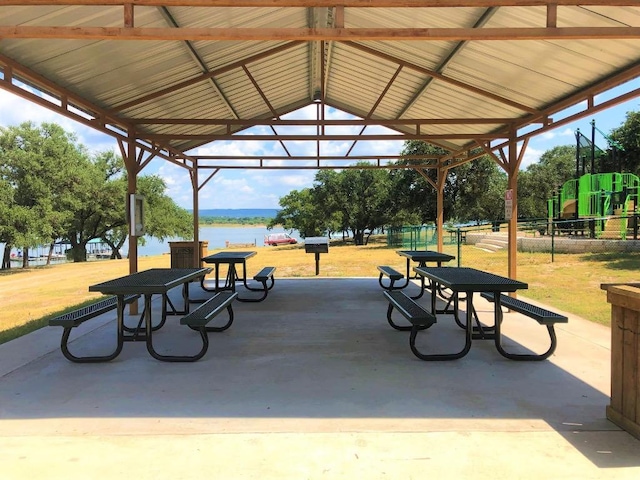 3225 Eisenhower Ave, Lago Vista, TX 78645 - view of community featuring a gazebo, a water view, a lawn, and a patio