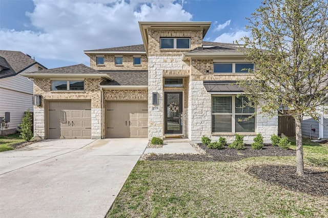1205 Bluewood Bnd, Leander, TX 78641 - prairie-style home with driveway, stone siding, an attached garage, and a shingled roof