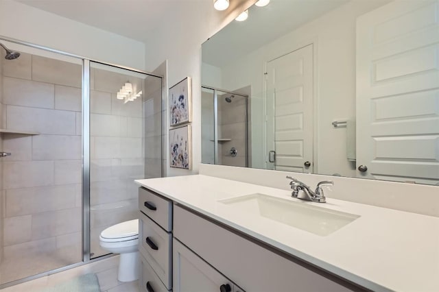 1205 Bluewood Bnd, Leander, TX 78641 - bathroom with vanity, a stall shower, toilet, and tile patterned floors