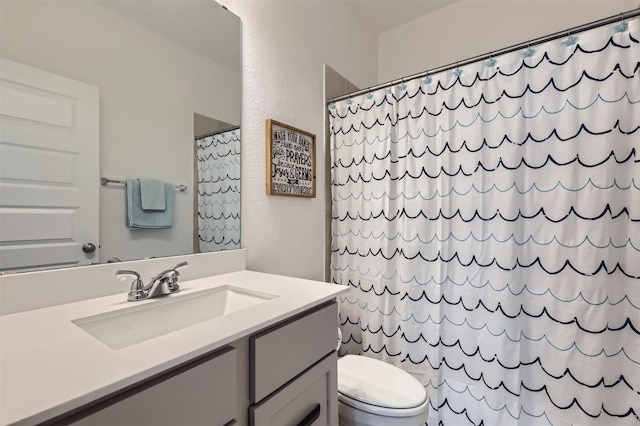 1205 Bluewood Bnd, Leander, TX 78641 - full bathroom with vanity, toilet, and a shower with shower curtain