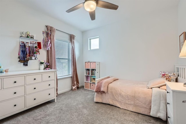 1205 Bluewood Bnd, Leander, TX 78641 - bedroom with carpet, baseboards, and a ceiling fan