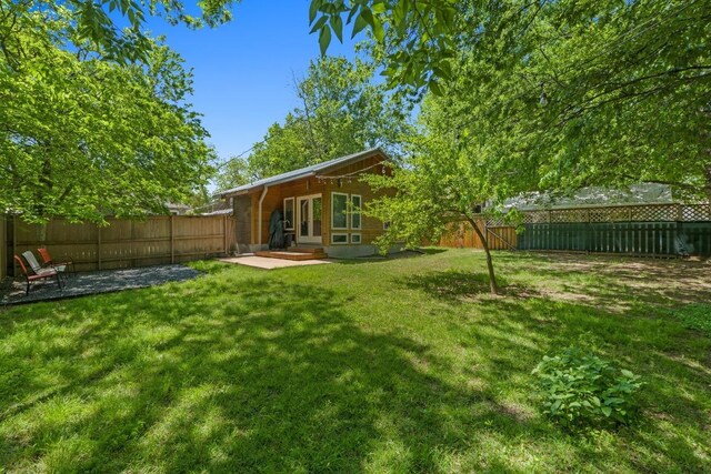 504 E 38th 1/2 St, Austin, TX 78751 - view of yard featuring a patio area