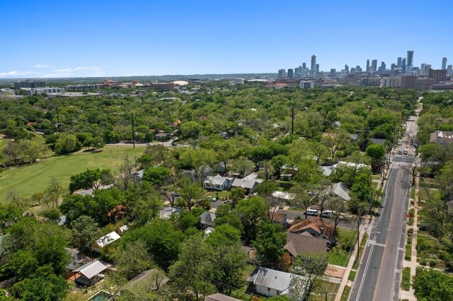 504 E 38th 1/2 St, Austin, TX 78751 - aerial view of property and surrounding area featuring city skyline