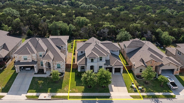 3912 Logan Ridge Dr, Cedar Park, TX 78613 - drone / aerial view with a residential view and a wooded view