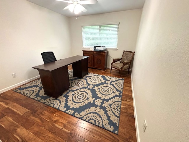 office with a ceiling fan, wood finished floors, and baseboards