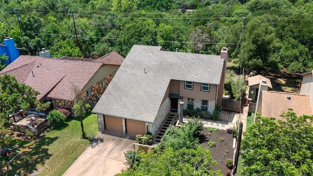 6551 Fair Valley Trl, Austin, TX 78749 - aerial view of property and surrounding area featuring a heavily wooded area