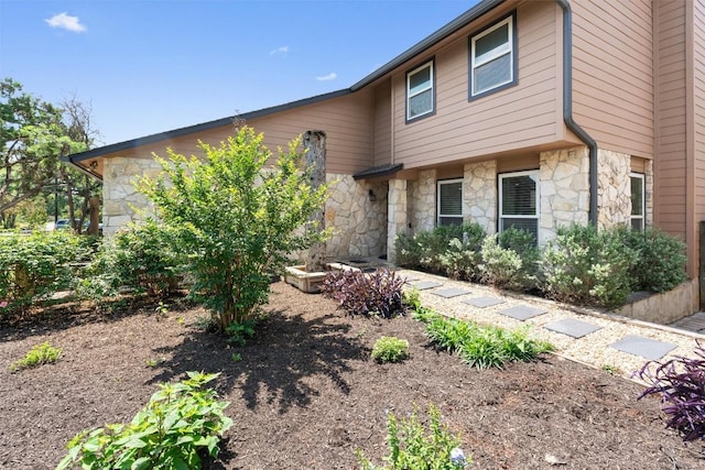 view of front of property with stone siding