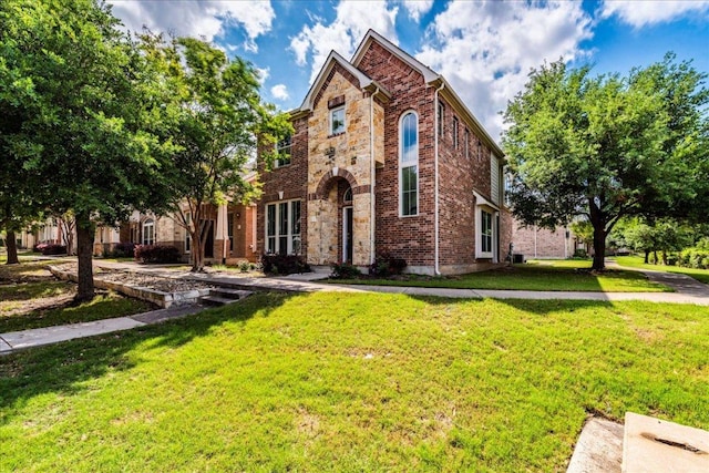 traditional home with a front lawn
