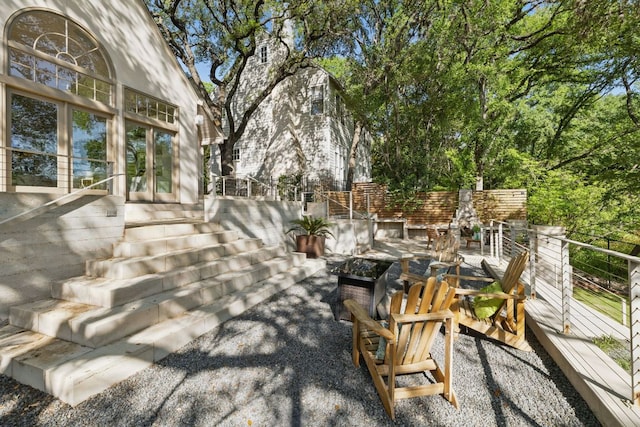 1006 Gaston Ave, Austin, TX 78703 - view of patio / terrace with stairs and a fire pit