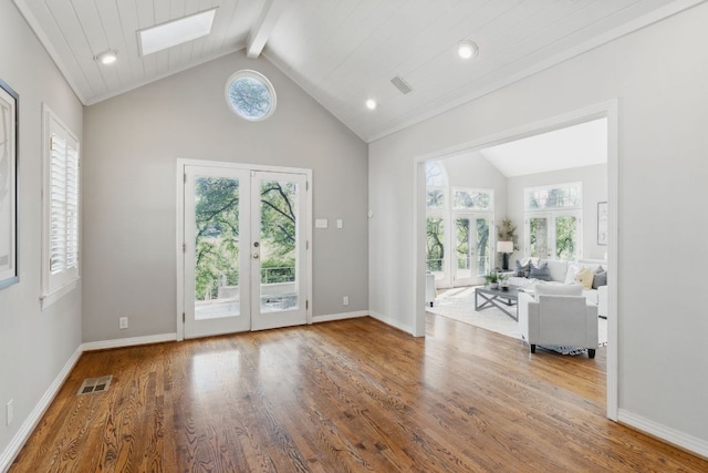 1006 Gaston Ave, Austin, TX 78703 - interior space featuring visible vents, wood finished floors, and a healthy amount of sunlight