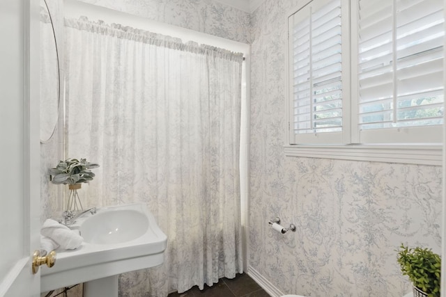 1006 Gaston Ave, Austin, TX 78703 - bathroom featuring a shower with shower curtain and tile patterned flooring