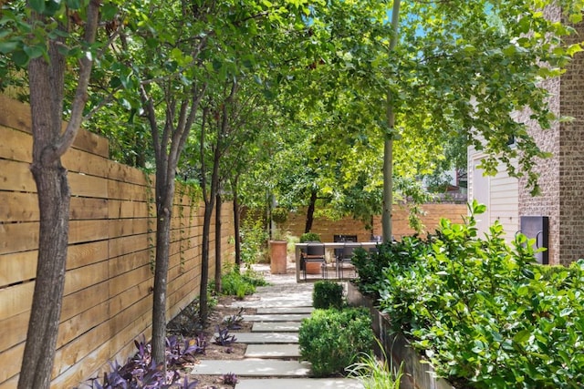 view of yard with a fenced backyard and a patio