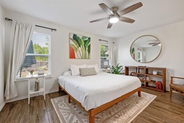 3116 Port Anne Way, Leander, TX 78641 - bedroom with wood finished floors, baseboards, and a ceiling fan