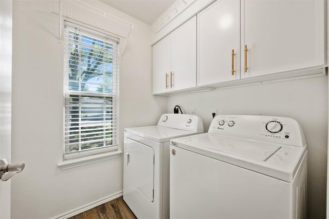 3116 Port Anne Way, Leander, TX 78641 - laundry room featuring cabinet space, washing machine and dryer, dark wood-style floors, and baseboards