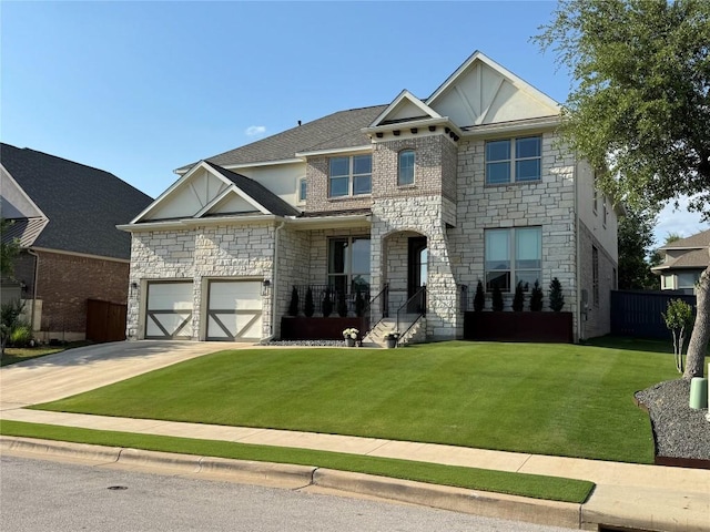 15500 La Catania Way, Austin, TX 78738 - view of front of home with stone siding, concrete driveway, and a garage