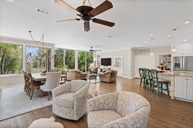 2409 Mormon Mill Rd, Marble Falls, TX 78654 - living area with ceiling fan, baseboards, and visible vents