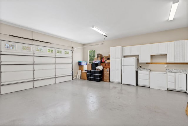 2409 Mormon Mill Rd, Marble Falls, TX 78654 - garage with freestanding refrigerator