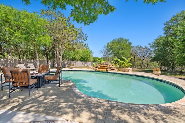 2409 Mormon Mill Rd, Marble Falls, TX 78654 - view of swimming pool with a fenced in pool, a patio area, and a fenced backyard
