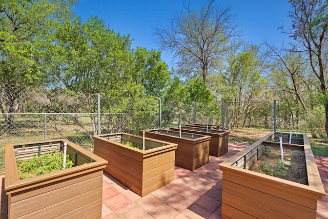 2409 Mormon Mill Rd, Marble Falls, TX 78654 - wooden deck featuring a garden and fence
