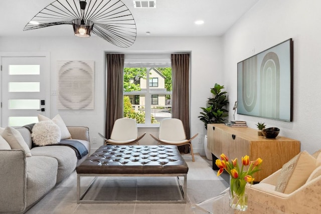 living room with a chandelier