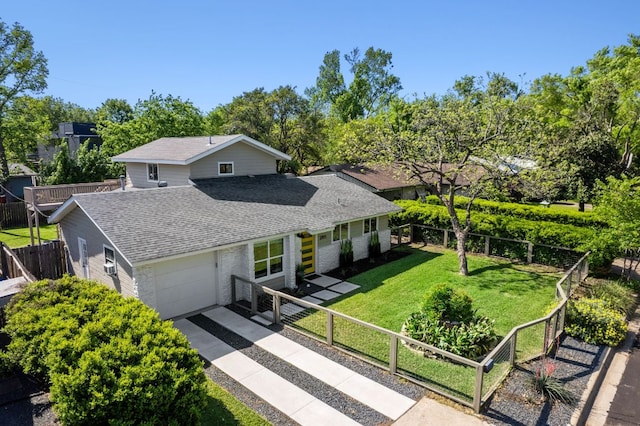 view of front of house featuring roof with shingles, a garage, and concrete driveway