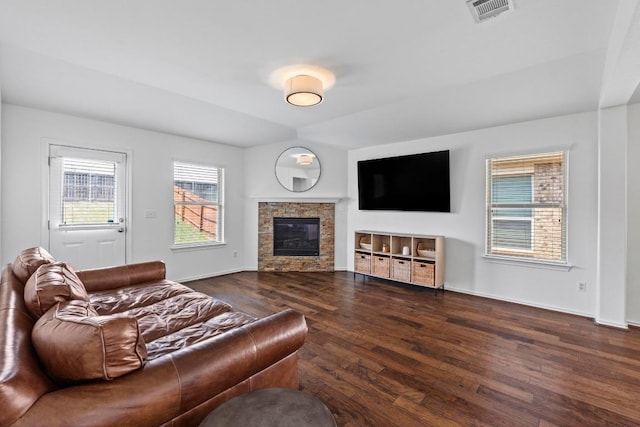 11928 Arran St, Austin, TX 78754 - living area featuring wood finished floors and a glass covered fireplace