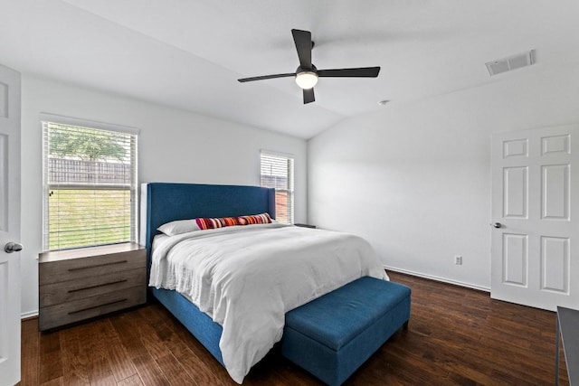 11928 Arran St, Austin, TX 78754 - bedroom with a ceiling fan, vaulted ceiling, visible vents, and wood finished floors