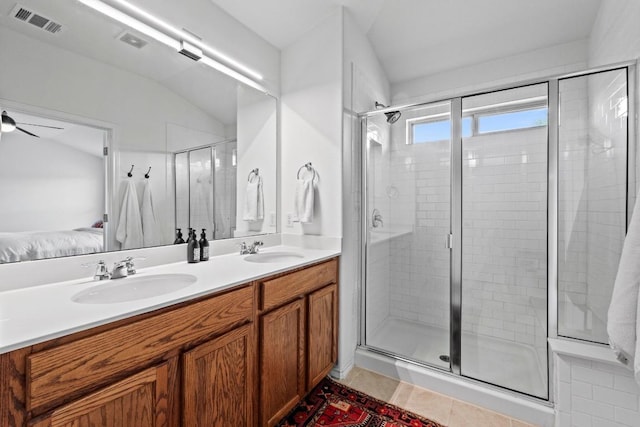 11928 Arran St, Austin, TX 78754 - ensuite bathroom featuring a sink, a stall shower, ensuite bath, and visible vents