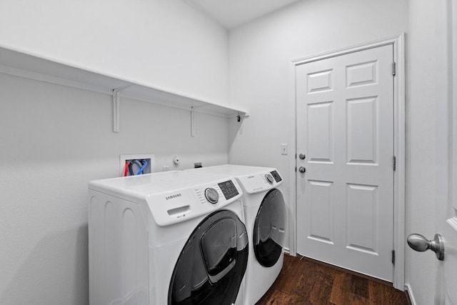 11928 Arran St, Austin, TX 78754 - laundry area with washing machine and clothes dryer, dark wood-style flooring, and laundry area