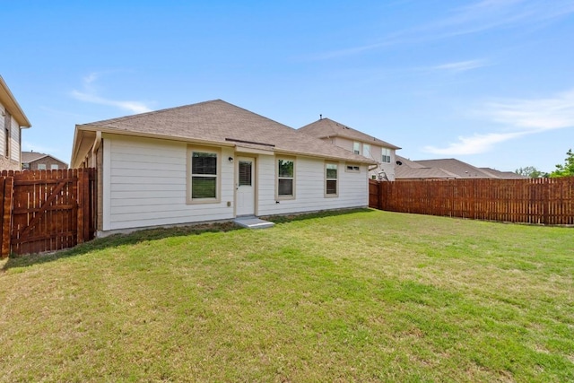 11928 Arran St, Austin, TX 78754 - rear view of house featuring a fenced backyard and a yard