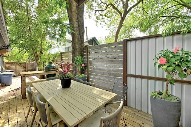 702 W Mary St, Austin, TX 78704 - deck featuring a fenced backyard and outdoor dining space