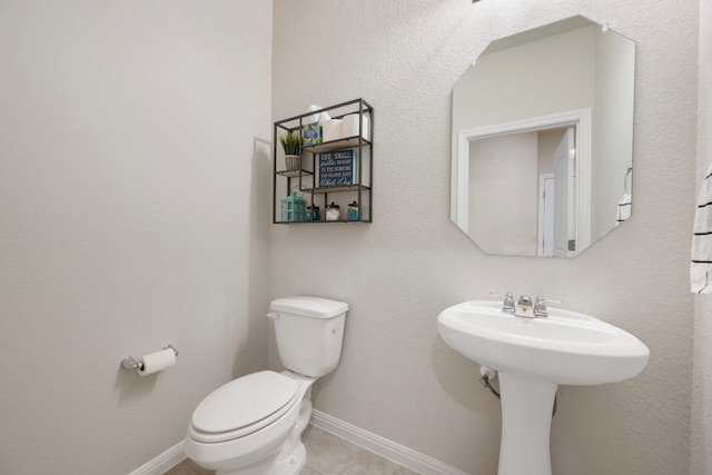 1921 Winston Way, Leander, TX 78641 - half bath with toilet and tile patterned floors