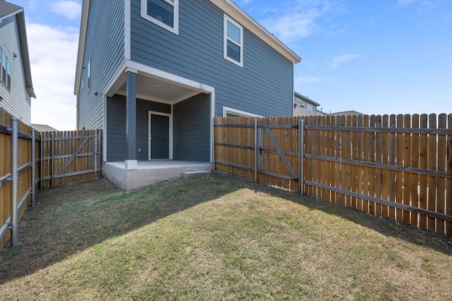 1921 Winston Way, Leander, TX 78641 - rear view of property with a fenced backyard and a gate