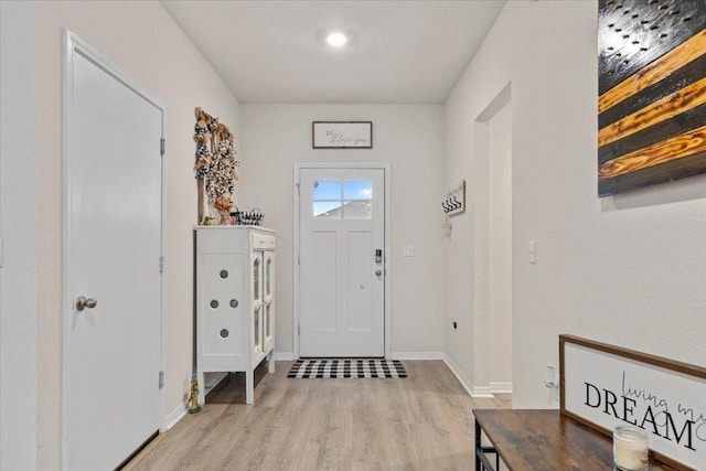 109 Sandpiper Dr, Bastrop, TX 78602 - entryway featuring light wood-style flooring and baseboards