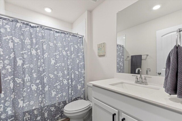 109 Sandpiper Dr, Bastrop, TX 78602 - bathroom with vanity, recessed lighting, and a shower with shower curtain