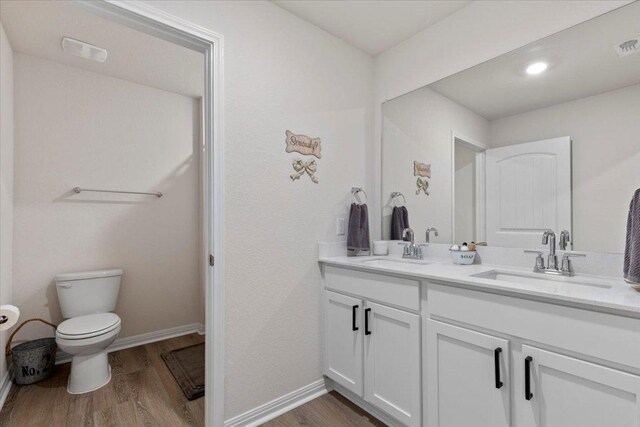 109 Sandpiper Dr, Bastrop, TX 78602 - full bath featuring double vanity and wood finished floors