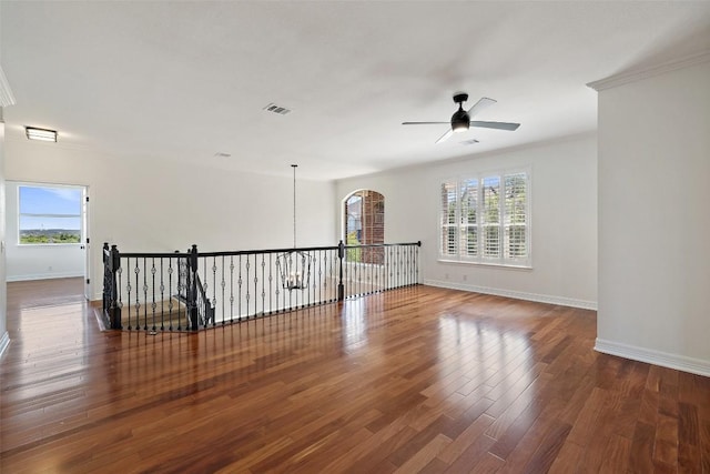12400 Fairfax Ridge Pl, Austin, TX 78738 - empty room with a ceiling fan, baseboards, plenty of natural light, and crown molding