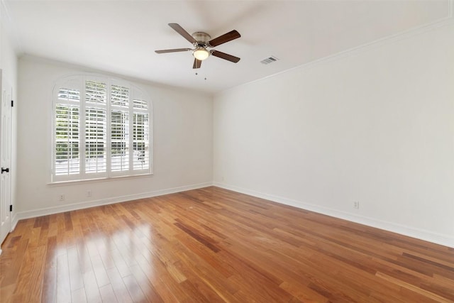 12400 Fairfax Ridge Pl, Austin, TX 78738 - empty room with light wood-type flooring, ceiling fan, baseboards, and ornamental molding