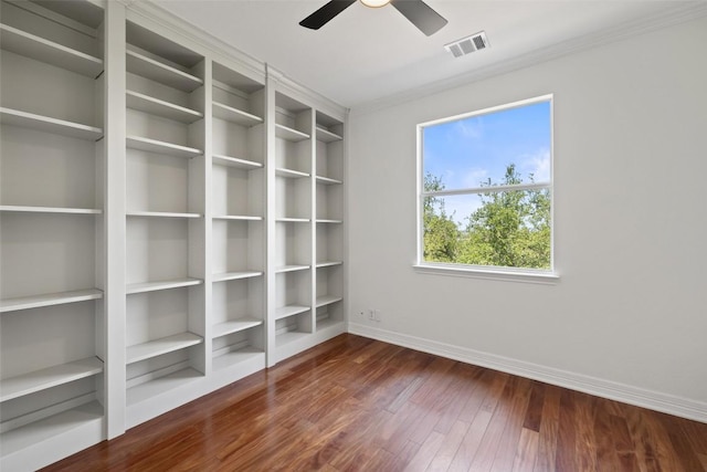 12400 Fairfax Ridge Pl, Austin, TX 78738 - spare room featuring baseboards, dark wood-type flooring, ceiling fan, and crown molding
