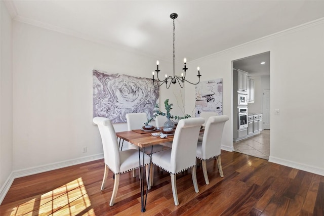 12400 Fairfax Ridge Pl, Austin, TX 78738 - dining room featuring a chandelier, wood finished floors, crown molding, and baseboards