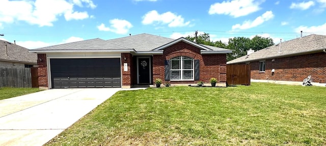 ranch-style house with an attached garage, driveway, a front lawn, and brick siding