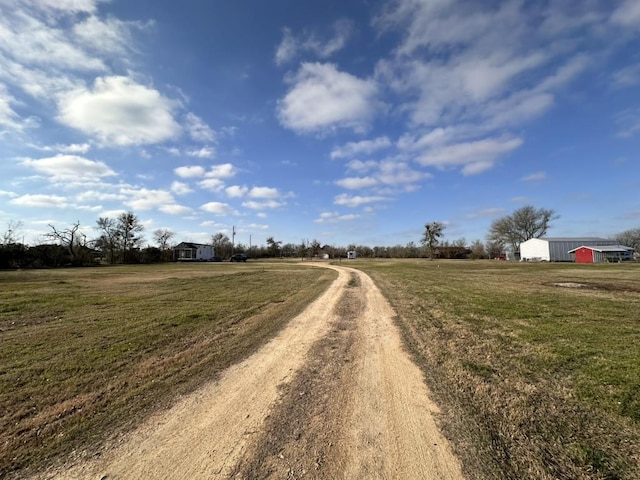 view of road with a rural view