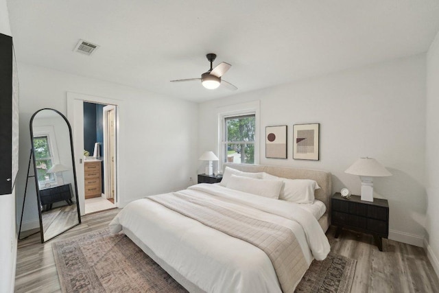 6111 Bridlington Cir, Austin, TX 78745 - bedroom featuring light wood-style floors and a ceiling fan