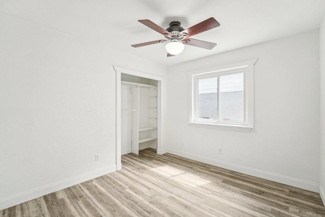 6111 Bridlington Cir, Austin, TX 78745 - unfurnished bedroom featuring light wood finished floors, a closet, and ceiling fan