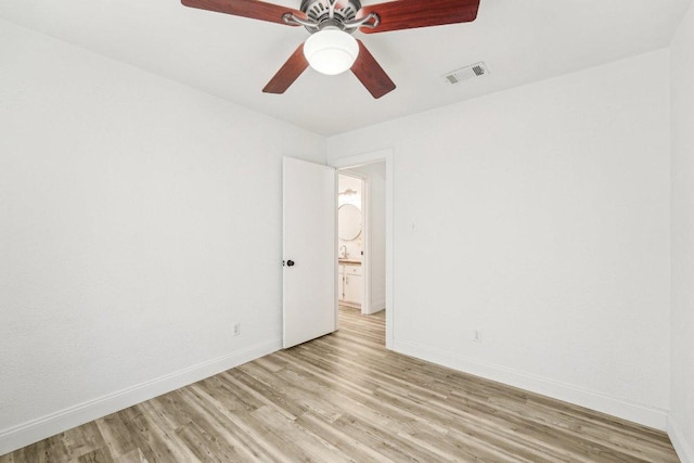 6111 Bridlington Cir, Austin, TX 78745 - unfurnished room with light wood-style flooring and a ceiling fan