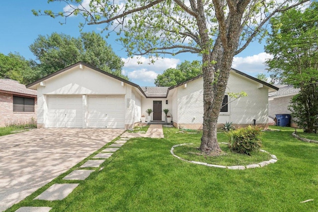 6111 Bridlington Cir, Austin, TX 78745 - view of front of property with an attached garage, concrete driveway, a front yard, and brick siding