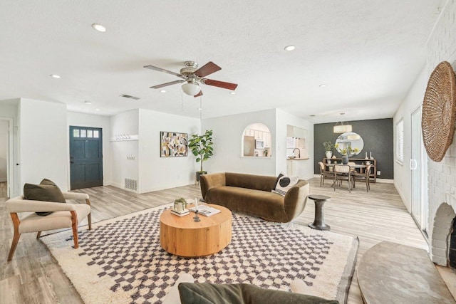 6111 Bridlington Cir, Austin, TX 78745 - living room with light wood-type flooring, ceiling fan, and recessed lighting