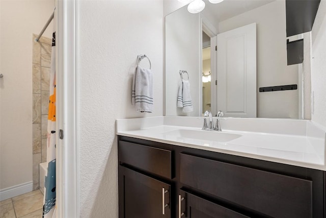 624 Anfield Cir, Austin, TX 78738 - bathroom featuring vanity, tile patterned flooring, and shower / tub combo