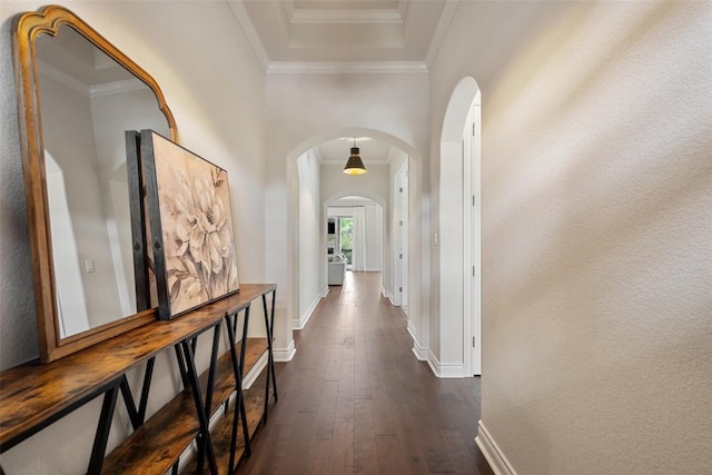 624 Anfield Cir, Austin, TX 78738 - hall with arched walkways, dark wood-style floors, baseboards, and ornamental molding