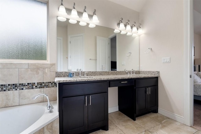624 Anfield Cir, Austin, TX 78738 - full bathroom featuring double vanity, tile patterned flooring, a bath, and baseboards